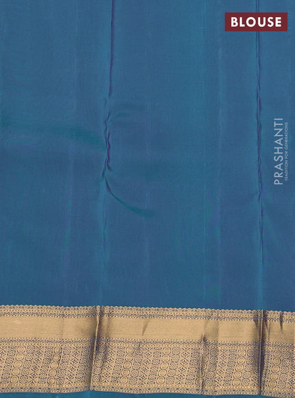 Kanchipuram silk saree lavender and teal green with zari woven buttas and zari woven border