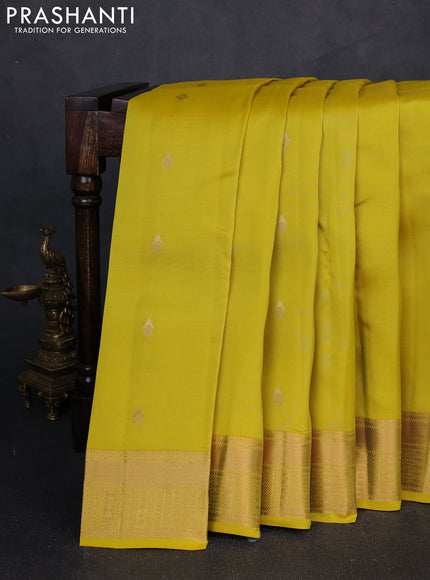 Kanchipuram silk saree yellow and teal green with zari woven buttas and zari woven border