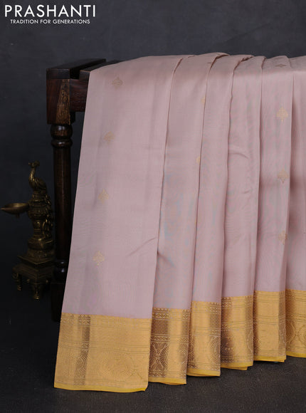 Kanchipuram silk saree beige and yellow with zari woven buttas and zari woven border