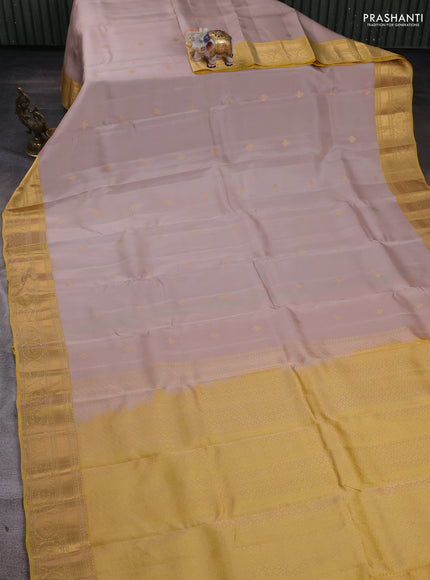 Kanchipuram silk saree beige and yellow with zari woven buttas and zari woven border