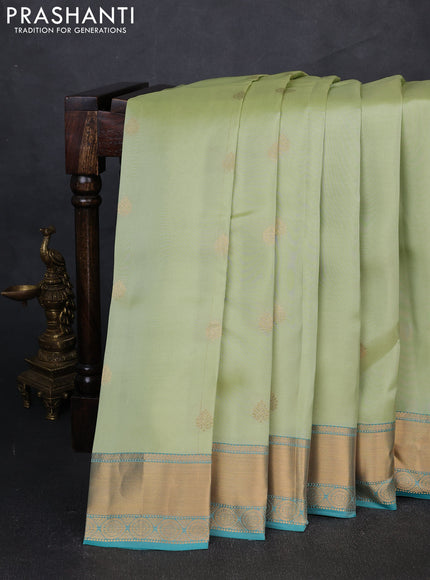 Kanchipuram silk saree pista green and teal green shade with zari woven buttas and zari woven border