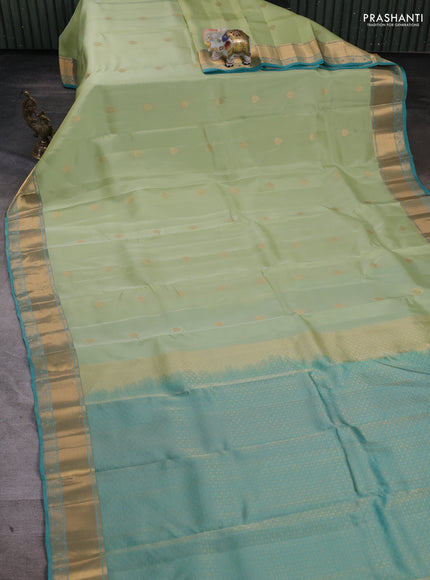 Kanchipuram silk saree pista green and teal green shade with zari woven buttas and zari woven border