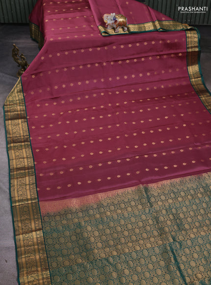 Kanchipuram silk saree mauve pink and green with allover zari woven buttas and zari woven border