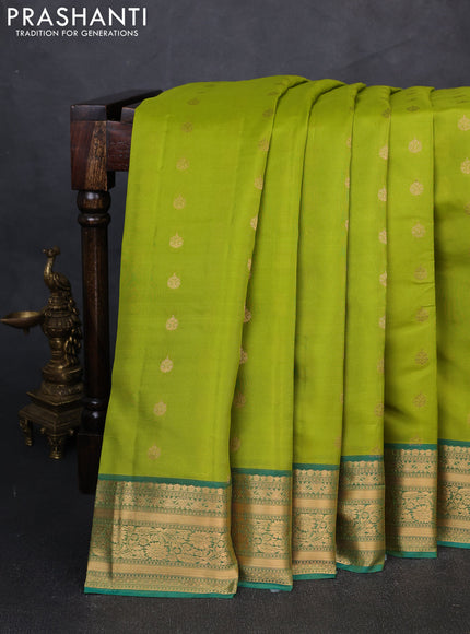 Kanchipuram silk saree light green and green with zari woven buttas and zari woven border