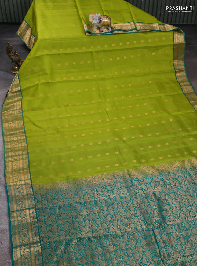 Kanchipuram silk saree light green and green with zari woven buttas and zari woven border