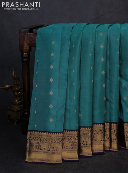 Kanchipuram silk saree teal green and navy blue with zari woven buttas and zari woven border