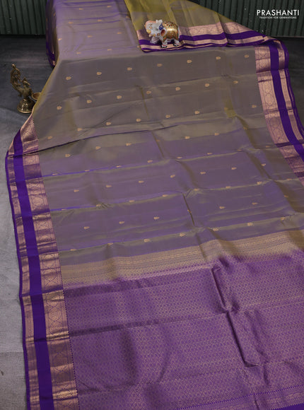 Kanchipuram silk saree meetalic green and purple with zari woven buttas and rettapet zari woven border