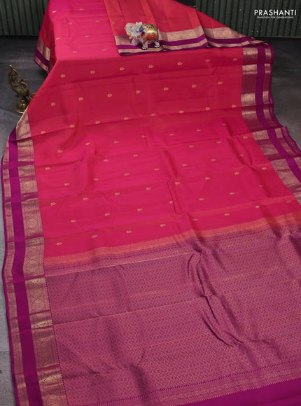 Kanchipuram silk saree dual tone pinkish oorange and purple with zari woven buttas and rettapet zari woven border