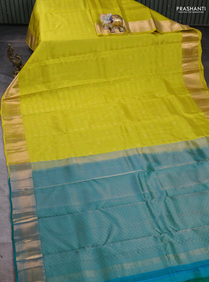 Kanchipuram silk saree lime yellow and teal green with allover zari checks & buttas and rich zari woven border