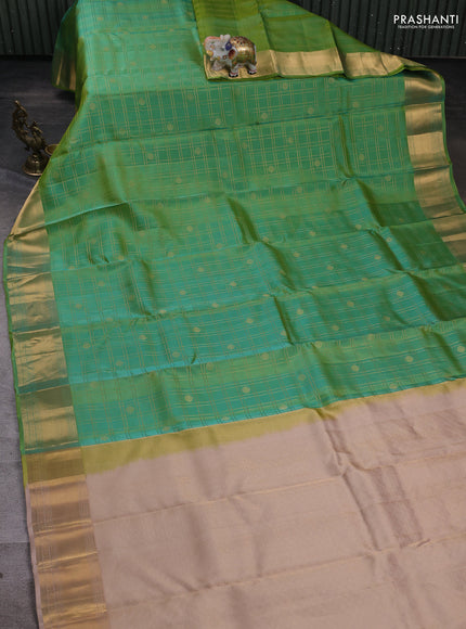 Kanchipuram silk saree teal green and beige with allover zari checks & buttas and rich zari woven border
