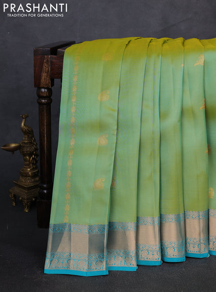 Kanchipuram silk saree dual tone light green and teal blue with zari woven buttas and zari woven border
