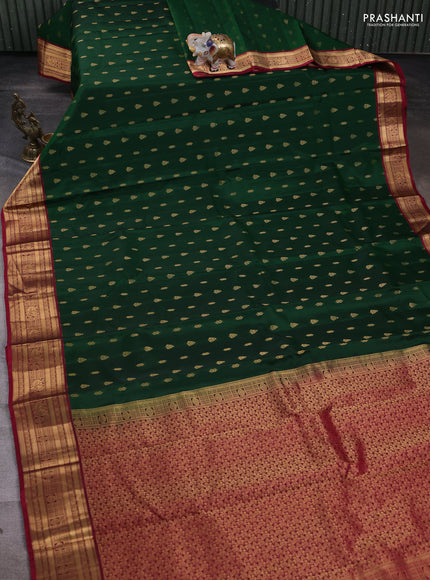 Kanchipuram silk saree green and pink with allover zari woven buttas and rich zari woven border