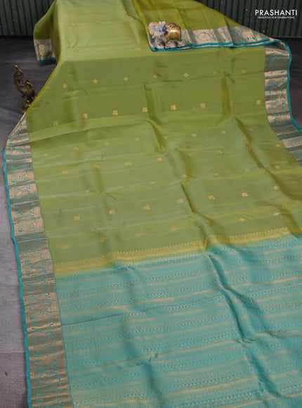 Kanchipuram silk saree pista green and teal blue with zari woven buttas and rich zari woven border