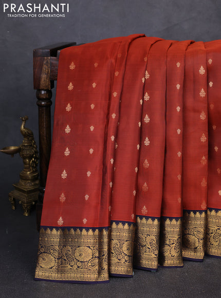 Kanchipuram silk saree rust shade and navy blue with allover zari woven buttas and rich zari woven border