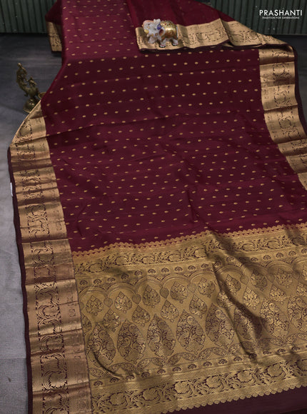 Kanchipuram silk saree deep maroon and coffee brown with allover zari woven buttas and rich zari woven border