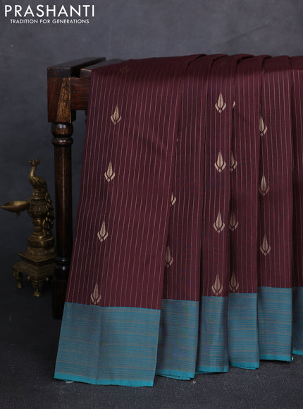 Kanchipuram silk saree coffee brown and teal green with allover zariw weaves and zari woven border