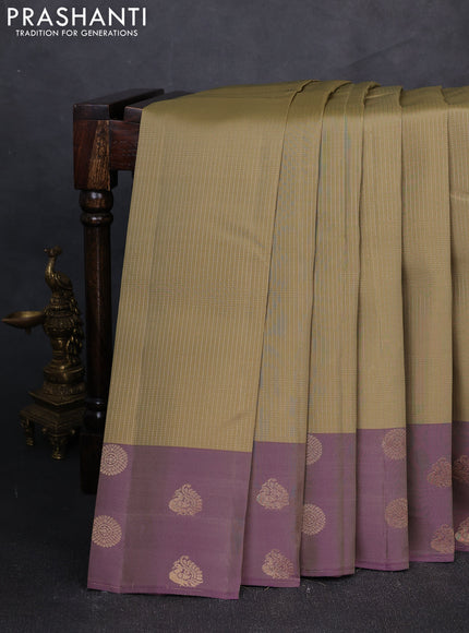 Kanchipuram silk saree elaichi green and dual tone purple with allover zari stripe pattern and zari woven butta border