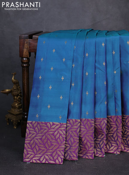 Kanchipuram silk saree dual shade of peacock green and purple with zari woven buttas and zari woven border