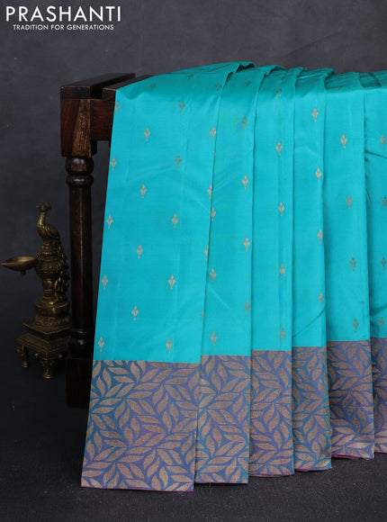 Kanchipuram silk saree teal blue and dual tone purple with zari woven buttas and zari woven border