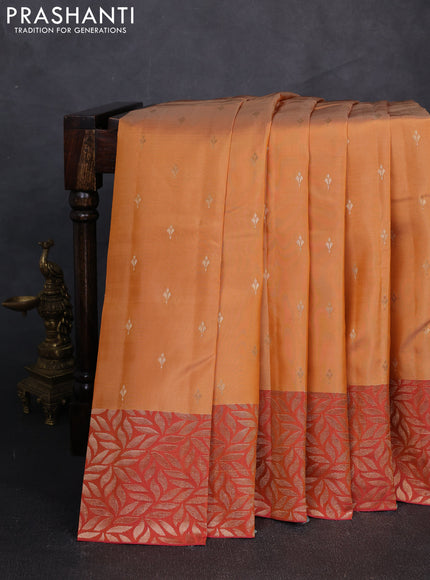 Kanchipuram silk saree sandal and dual tone rustic pink with zari woven buttas and zari woven border