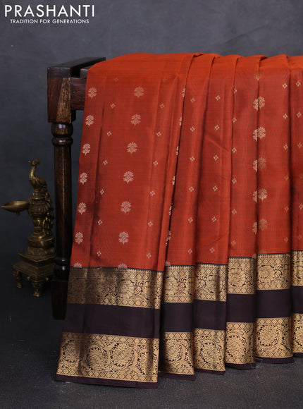 Kanchipuram silk saree rust shade and coffee brown with allover zari woven buttas and rettapet zari woven border