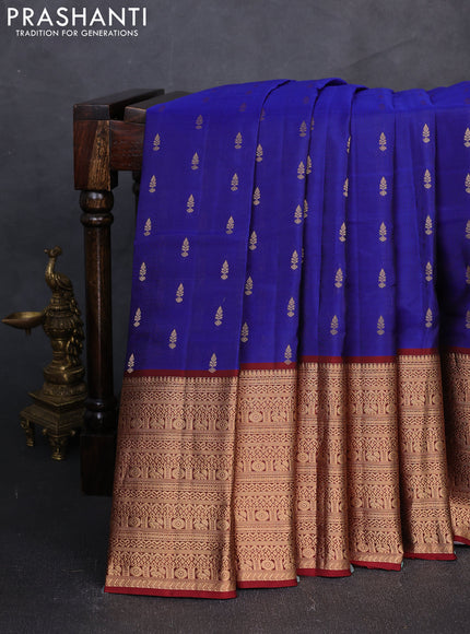 Kanchipuram silk saree blue and deep maroon with allover zari woven buttas and long zari woven border