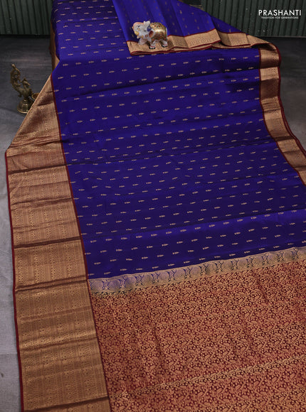 Kanchipuram silk saree blue and deep maroon with allover zari woven buttas and long zari woven border