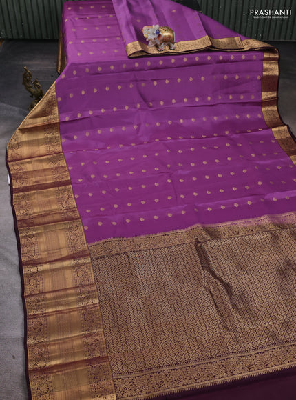 Kanchipuram silk saree purple shade and wine shade with zari woven buttas and long zari woven border