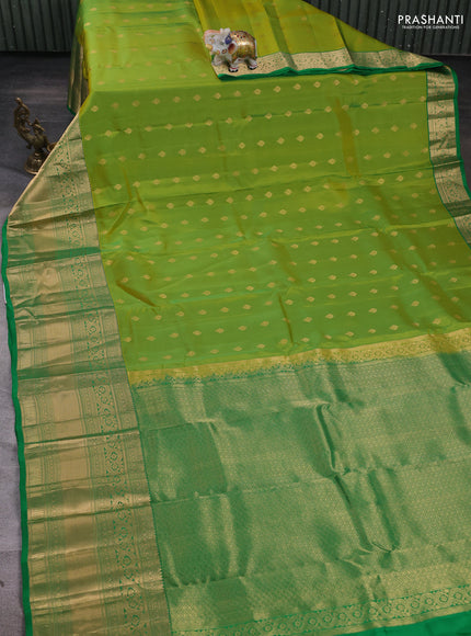 Kanchipuram silk saree light green and green with zari woven buttas and long zari woven border