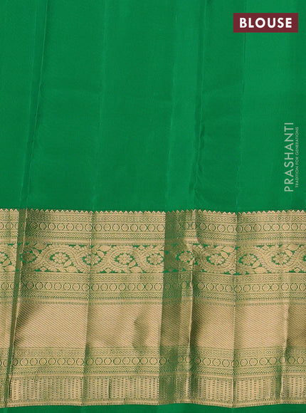 Kanchipuram silk saree light green and green with zari woven buttas and long zari woven border