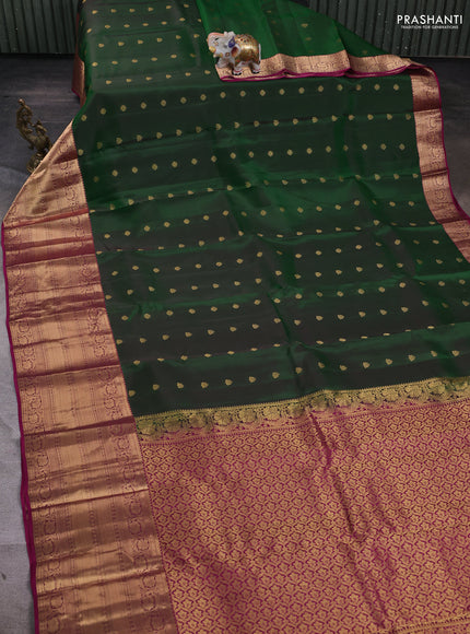 Kanchipuram silk saree dual tone green and dark magenta pink with zari woven buttas and long zari woven border