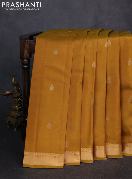 Kanchipuram silk saree dark mustard and pink with zari woven buttas and zari woven border