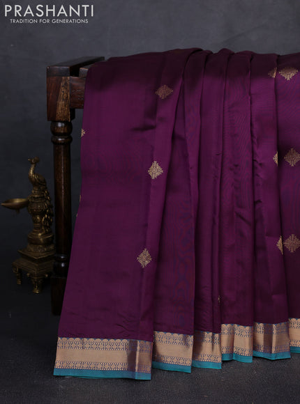 Kanchipuram silk saree deep purple and teal green with zari woven buttas and zari woven border