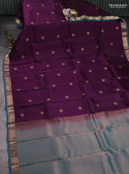 Kanchipuram silk saree deep purple and teal green with zari woven buttas and zari woven border