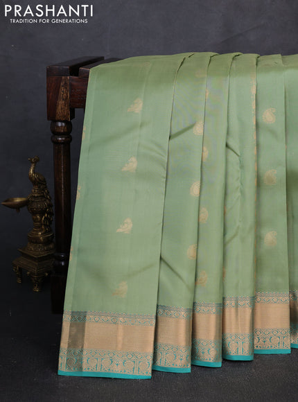 Kanchipuram silk saree pista green and teal green with zari woven buttas and zari woven border