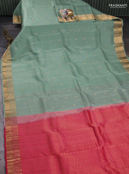 Kanchipuram silk saree pastel green and tomato pink with allover zari weaves & buttas and zari woven border