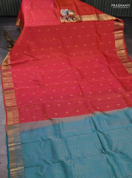 Kanchipuram silk saree dual tone pinkish orange and teal green with allover zari weaves & buttas and zari woven border