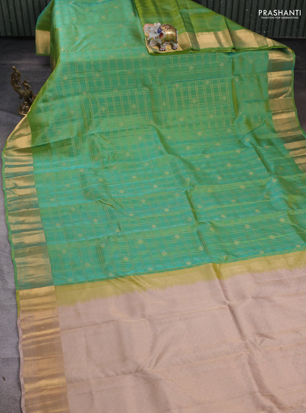 Kanchipuram silk saree teal green and beige with allover zari checks & buttas and zari woven border