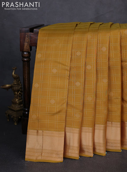 Kanchipuram silk saree dark mustard and beige with allover zari checks & buttas and zari woven border