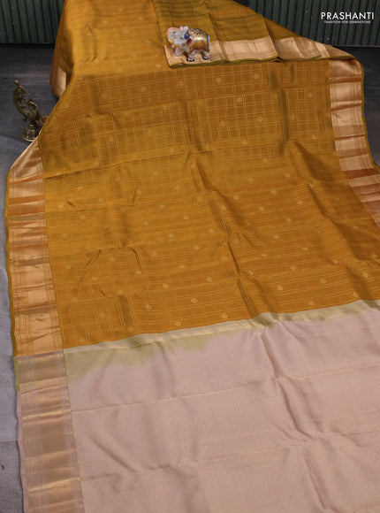 Kanchipuram silk saree dark mustard and beige with allover zari checks & buttas and zari woven border