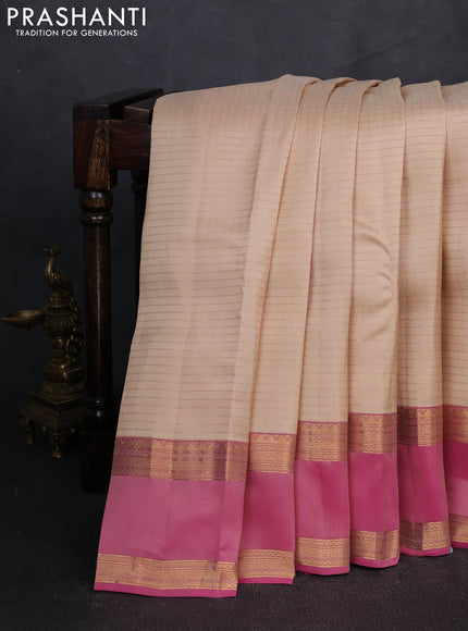 Kanchipuram silk saree beige and pink with allover zari checked pattern and rettapet zari woven border