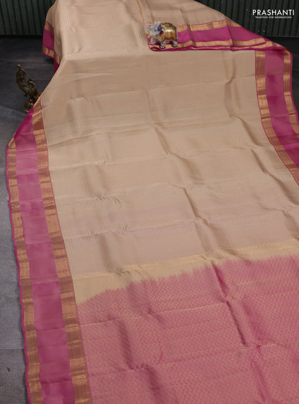 Kanchipuram silk saree beige and pink with allover zari checked pattern and rettapet zari woven border
