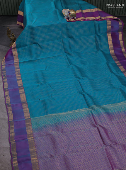 Kanchipuram silk saree teal blue and dual tone purple with allover zari checked pattern and rettapet zari woven border