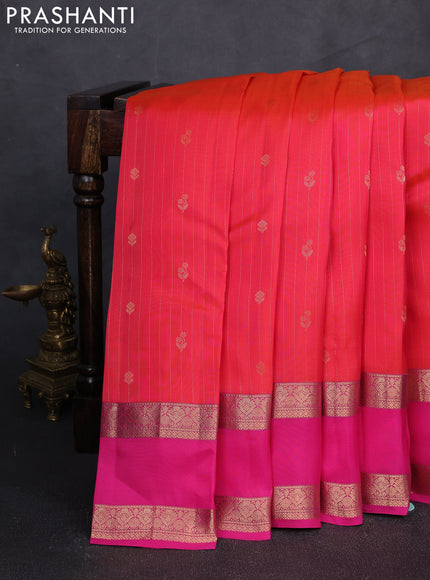 Kanchipuram silk saree dual tone pinkish orange and pink with allover zari weaves and rettapet zari woven border