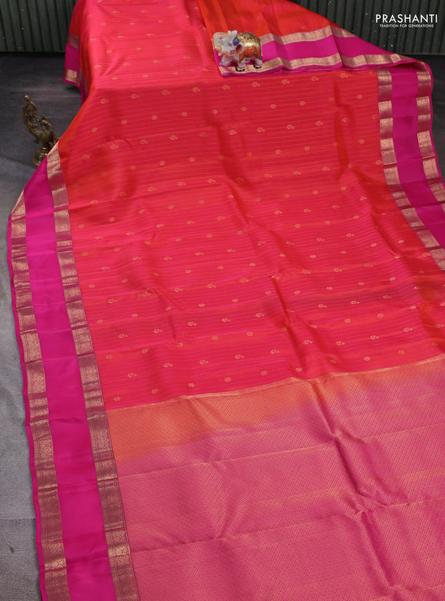 Kanchipuram silk saree dual tone pinkish orange and pink with allover zari weaves and rettapet zari woven border