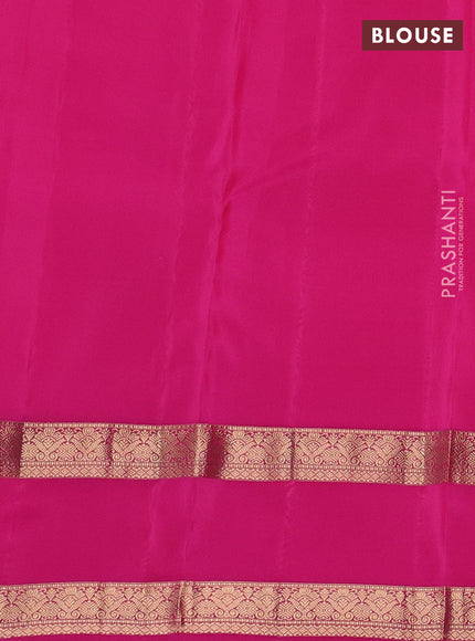 Kanchipuram silk saree dual tone pinkish orange and pink with allover zari weaves and rettapet zari woven border