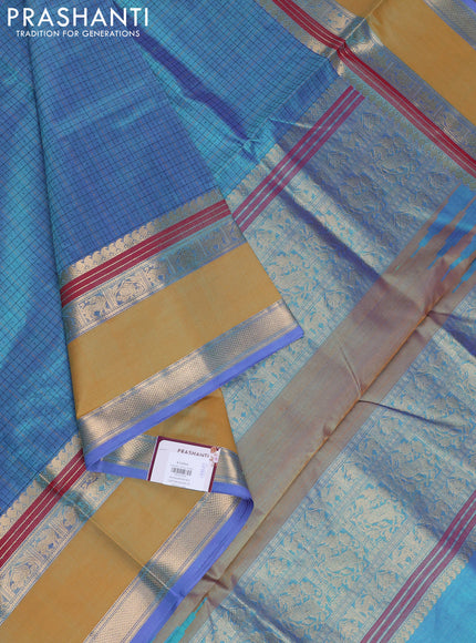 Kanchipuram silk cotton saree dual tone teal blue and mustard yellow with allover thread checks & buttas and rettapet zari woven border