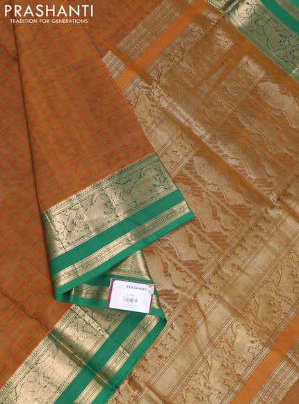 Kanchipuram silk cotton saree dark mustard and green with allover thread weaves and rettapet zari woven border