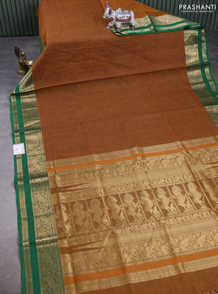 Kanchipuram silk cotton saree dark mustard and green with allover thread weaves and rettapet zari woven border