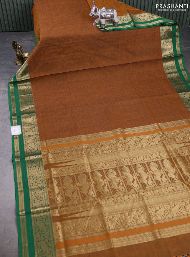 Kanchipuram silk cotton saree dark mustard and green with allover thread weaves and rettapet zari woven border
